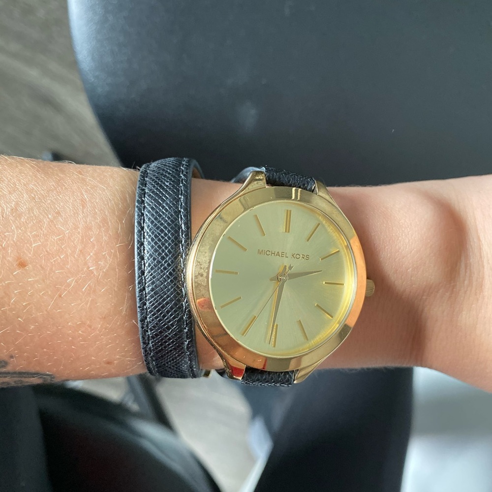 Black and gold Michael kors watch. Mk 2468